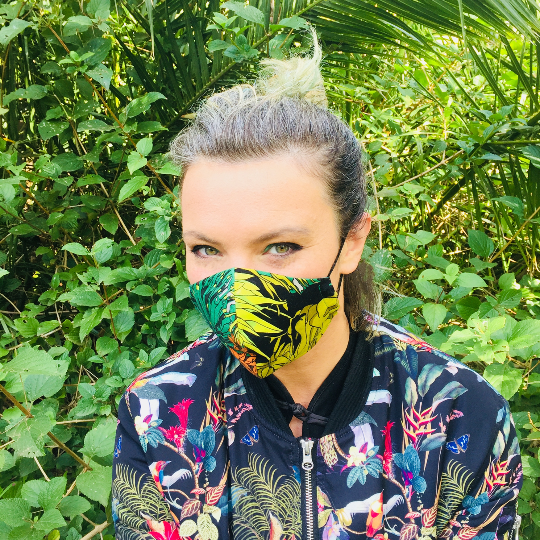 Triple layered face mask made in Melbourne Australia from cotton and poplin featuring a unique jungle print