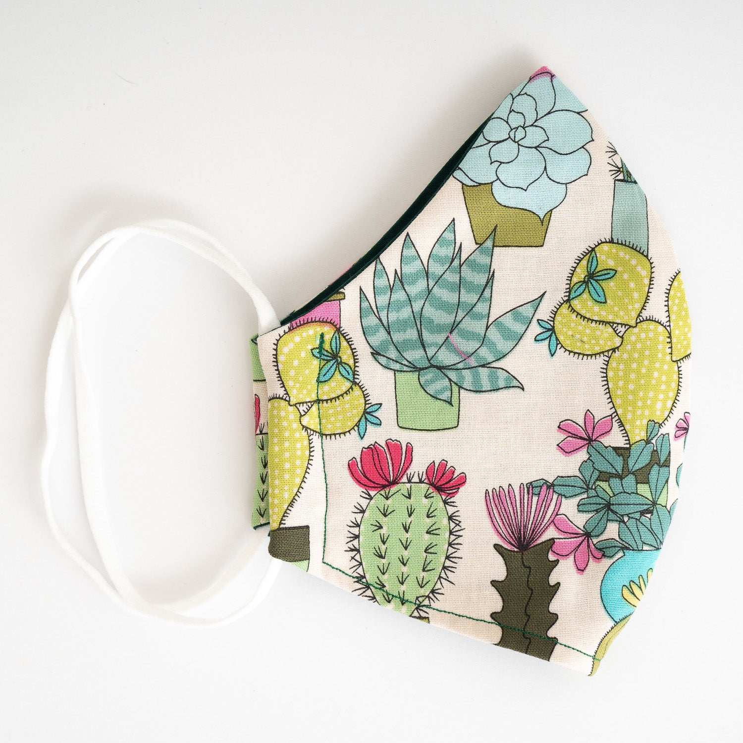 Triple layered face mask made in Melbourne Australia from cotton and poplin featuring a unique cactus print