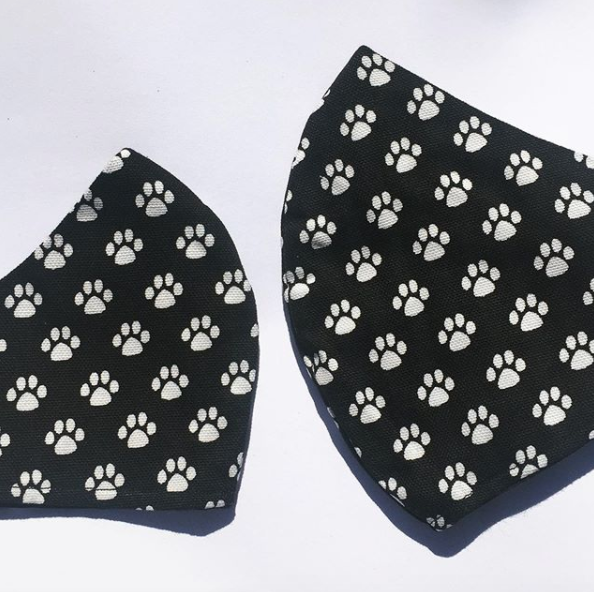 Triple layered face mask made in Melbourne Australia from cotton and poplin featuring a unique dog paw prints print