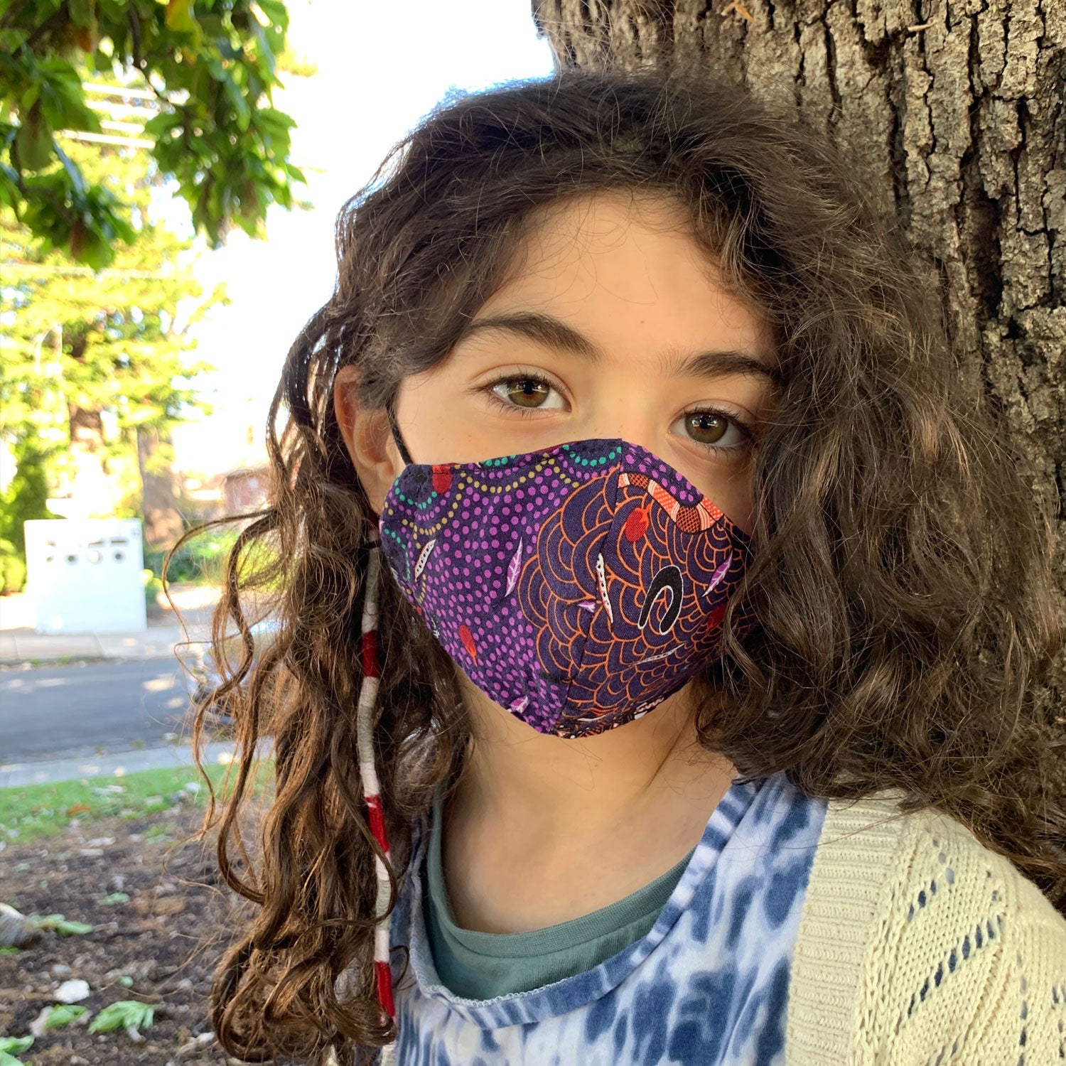 Triple layered kids face mask made in Melbourne Australia from cotton and poplin featuring a fun fox print