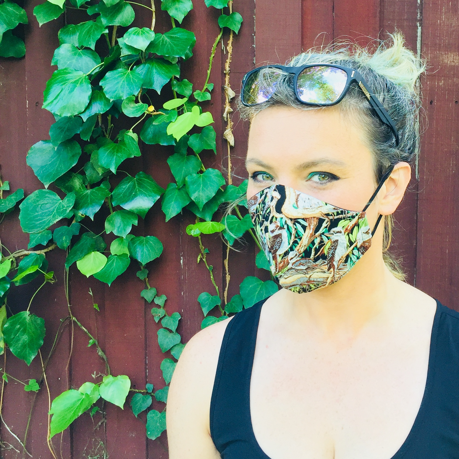 Triple layered face mask made in Melbourne Australia from cotton and poplin featuring a unique kookaburra print