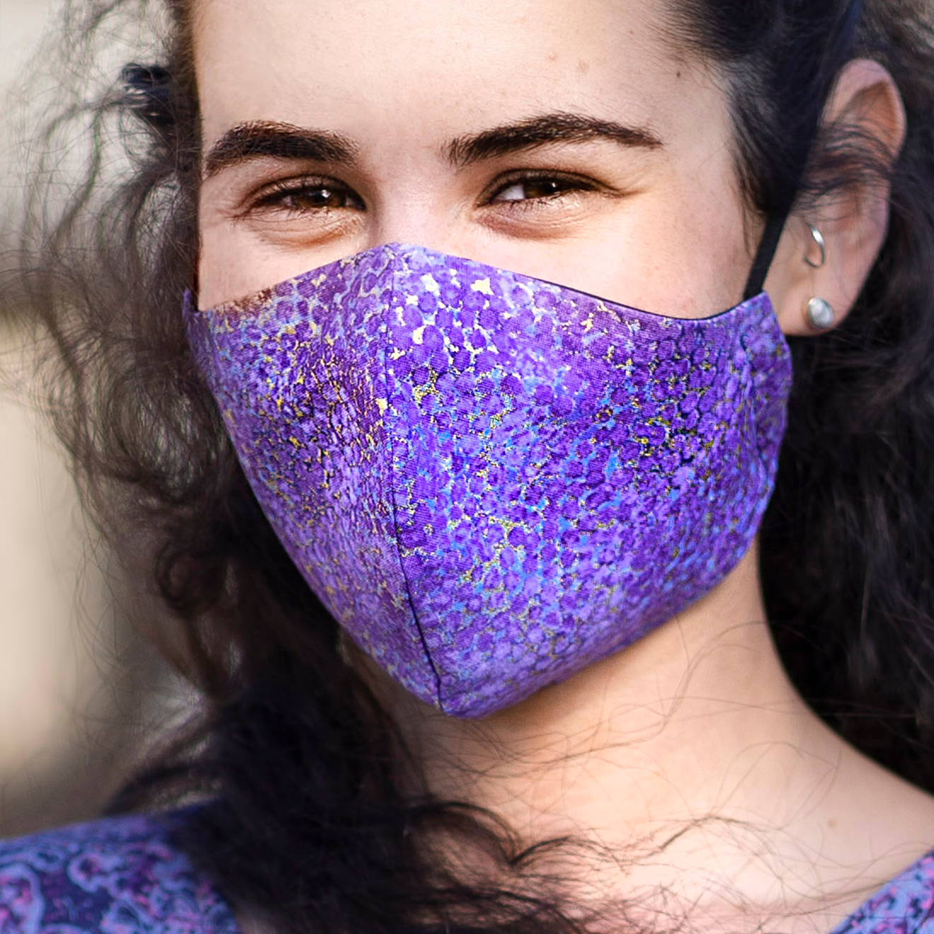 Triple layered face mask made in Melbourne Australia from cotton and poplin featuring a unique shiny glimmering lavender print