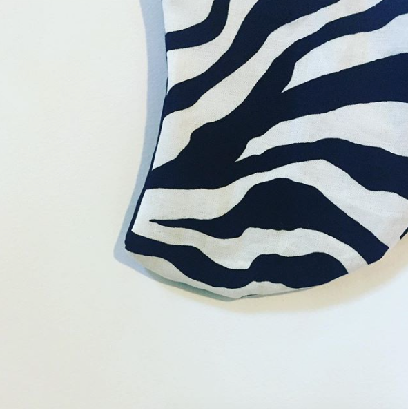 Triple layered face mask made in Melbourne Australia from cotton and poplin featuring a unique zebra stripy print