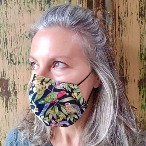 Triple layered face mask made in Melbourne Australia from cotton and poplin featuring a unique rainbow lorikeet bird parrot print